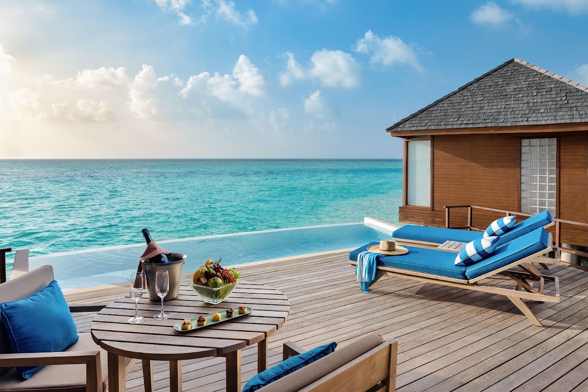 Sunrise Over Water Villa at Anantara Dhigu Maldives Resort