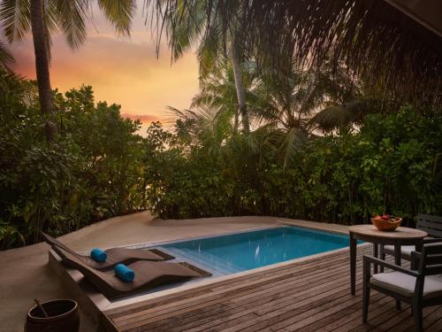 Deluxe Sunset Over Water Pool Villa at Anantara Resort and Spa Maldives