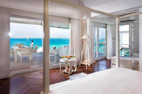 Beach Junior Suite at Diamonds Thudufushi Beach and Water Villas