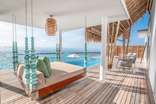 Beach Villa with Pool at Emerald Maldives Resort & Spa Fasmendho